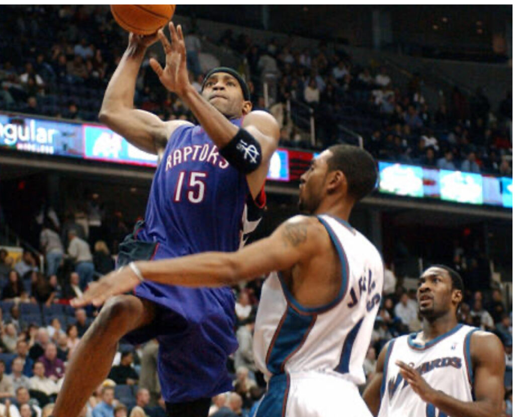 Vince Carter of the Toronto Raptors scores 2 of his team high 25 points in a game against the Washington Wizards on November 23, 2004 at MCI Center in Washington, D.C. The Wizards defeated the Raptors 102-86. (UPI Photo/Mark Goldman)